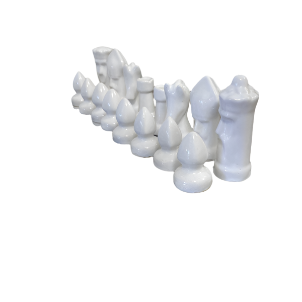 Set of white ceramic chess pieces