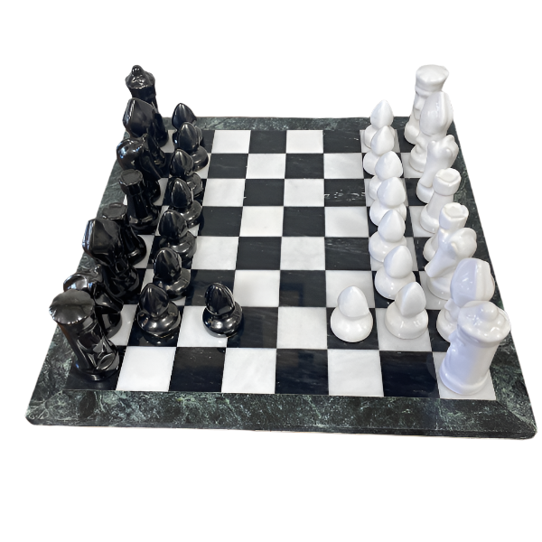 Black and white chess pieces on a checkered board with a marble-like surface.