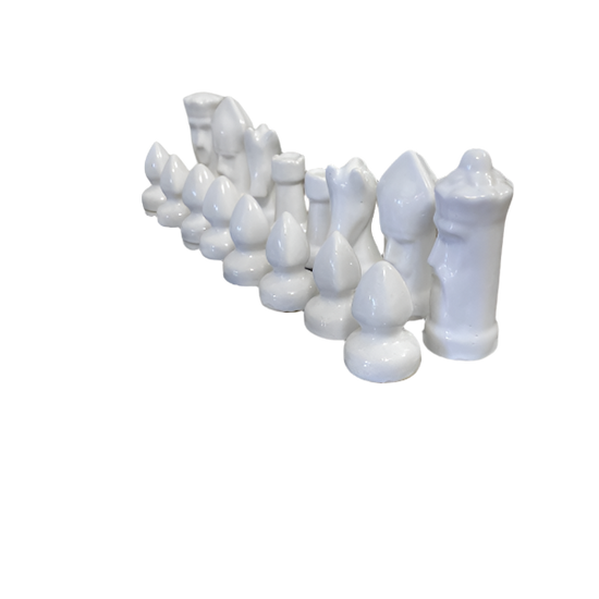 Set of white ceramic chess pieces 