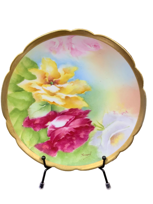 Decorative plate with floral design on a stand 