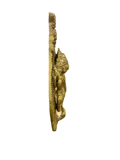 Decorative brass wall hook with artistic design